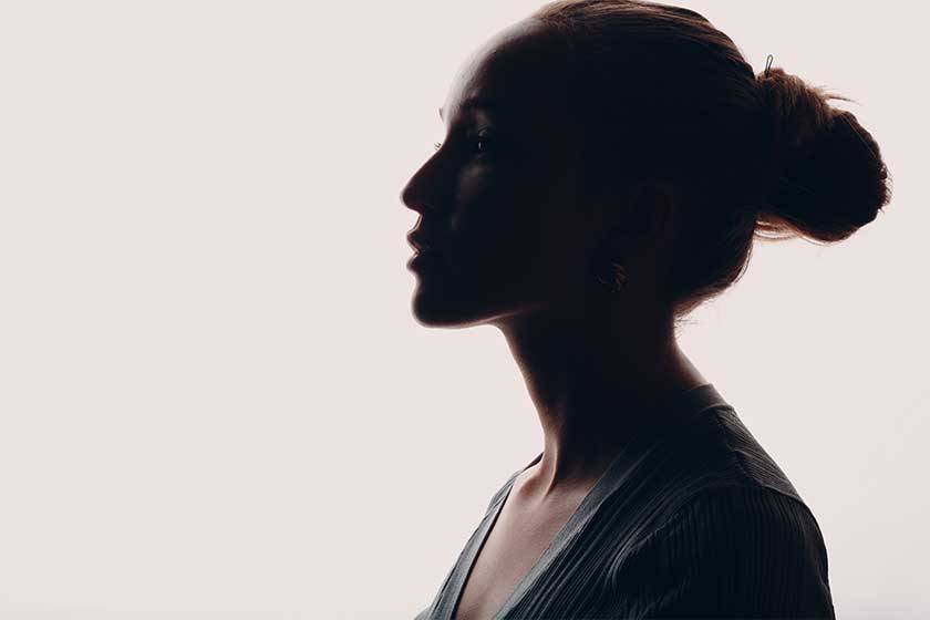 a woman's face looking forward